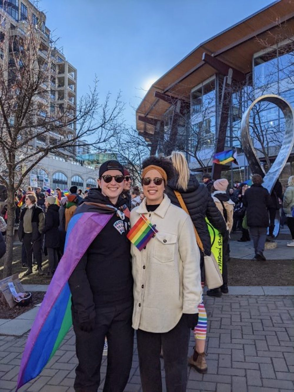 At a Pride protest in Kelowna with a rainbow flag
